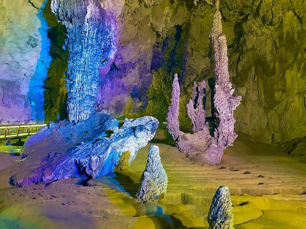 Some stalactites take on familiar shapes – lotus blossoms, waterfalls, even mythical creatures